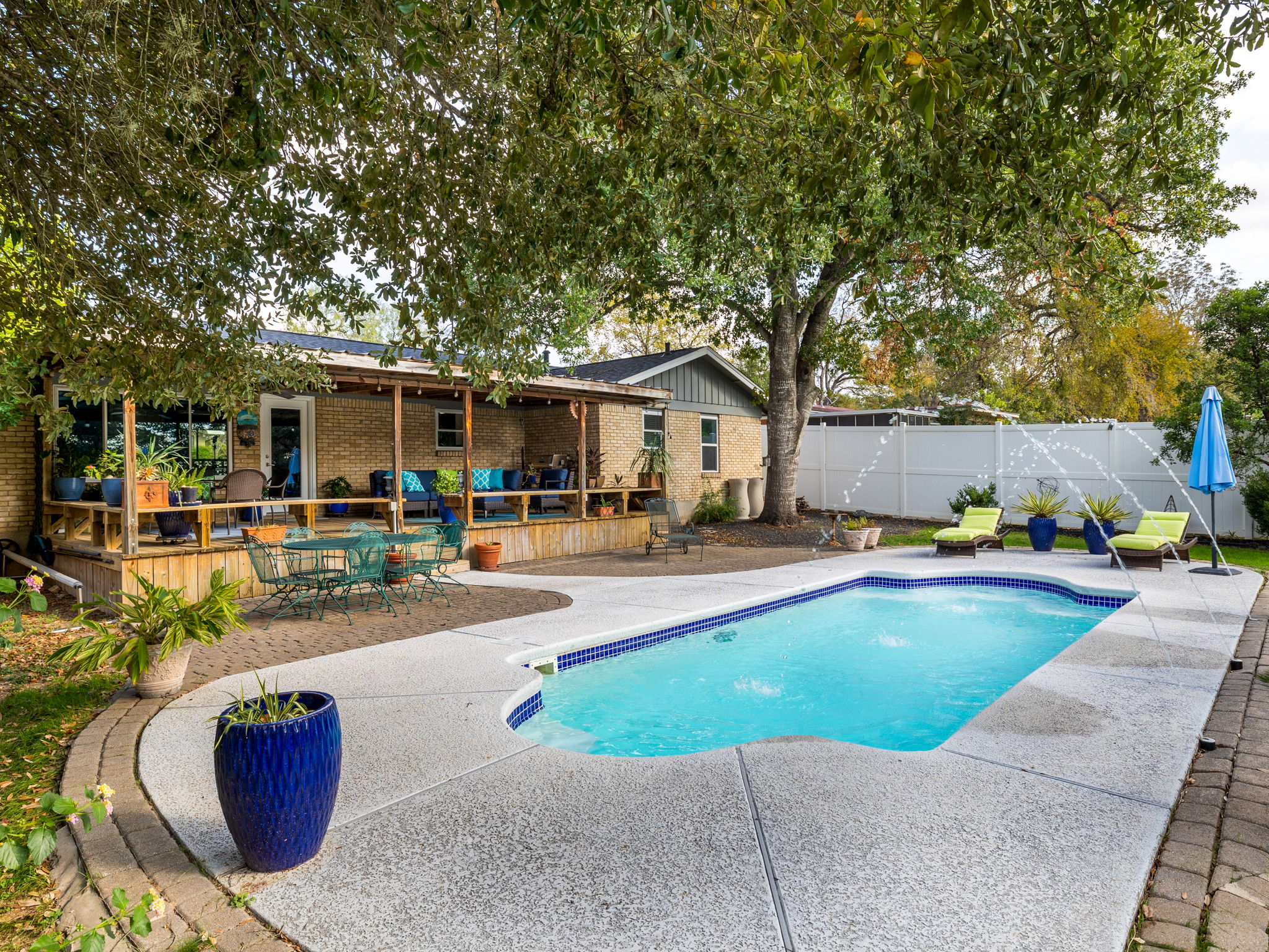 4710 Frontier Trail Austin, TX 78745 - Photo 24 of 32 a view of outdoor space yard swimming pool and patio