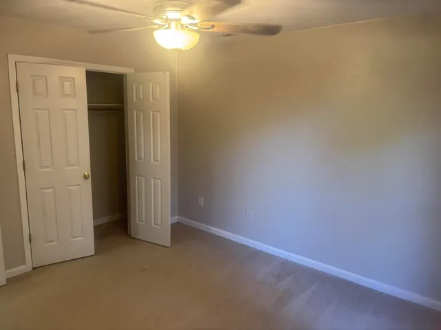 an empty room with a bathroom