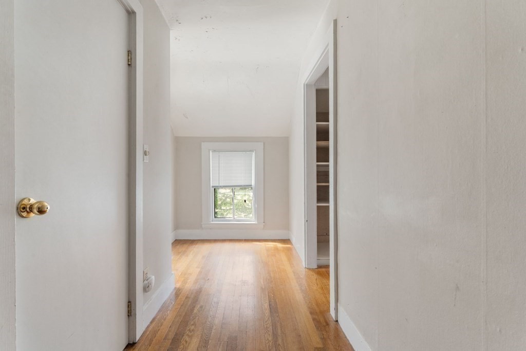 24 School Street Newton, MA 02458 - Photo 11 of 13 an empty room with windows