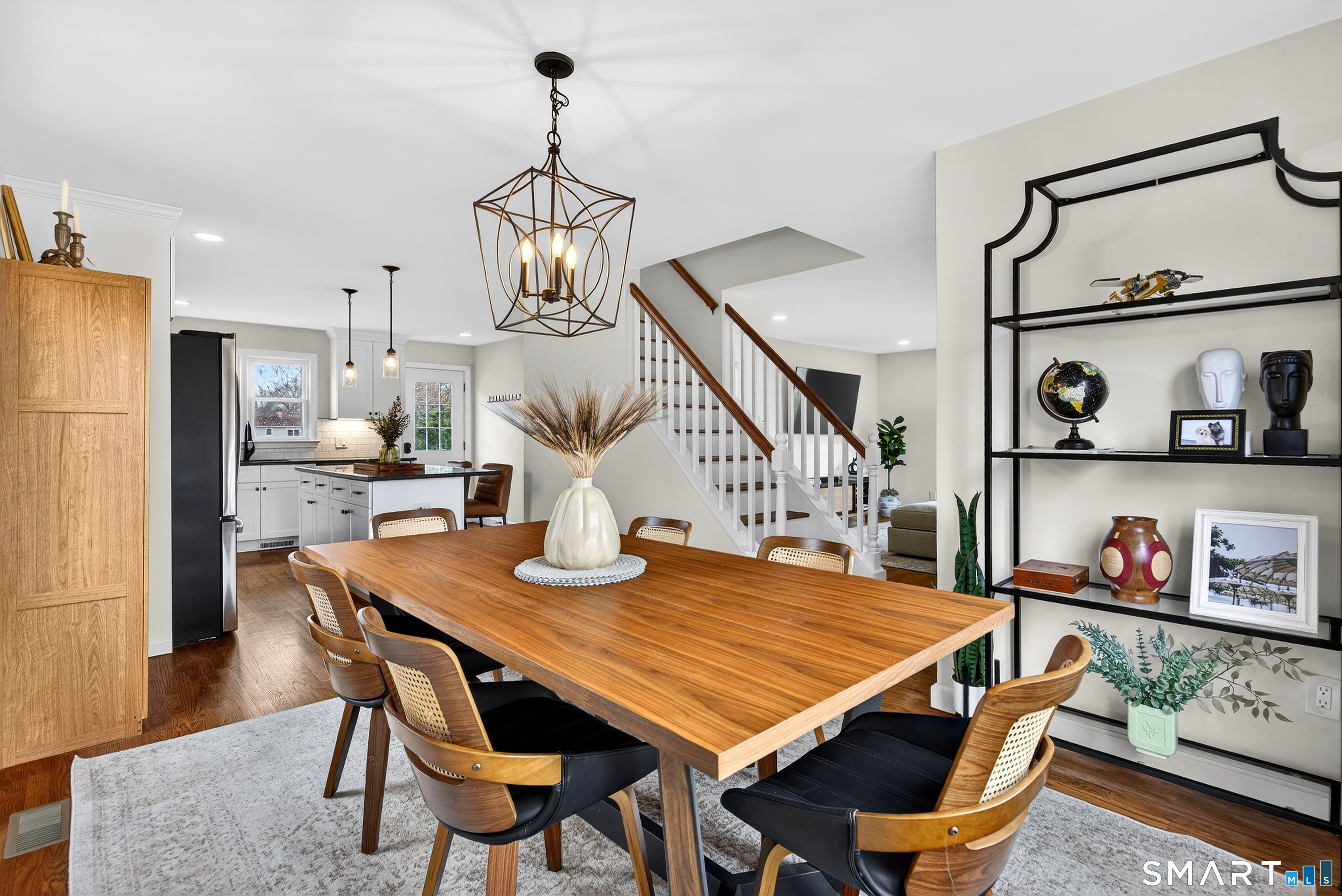 45 Walnut Street Milford, CT 06461 - Photo 11 of 39 a dining room with furniture and wooden floor