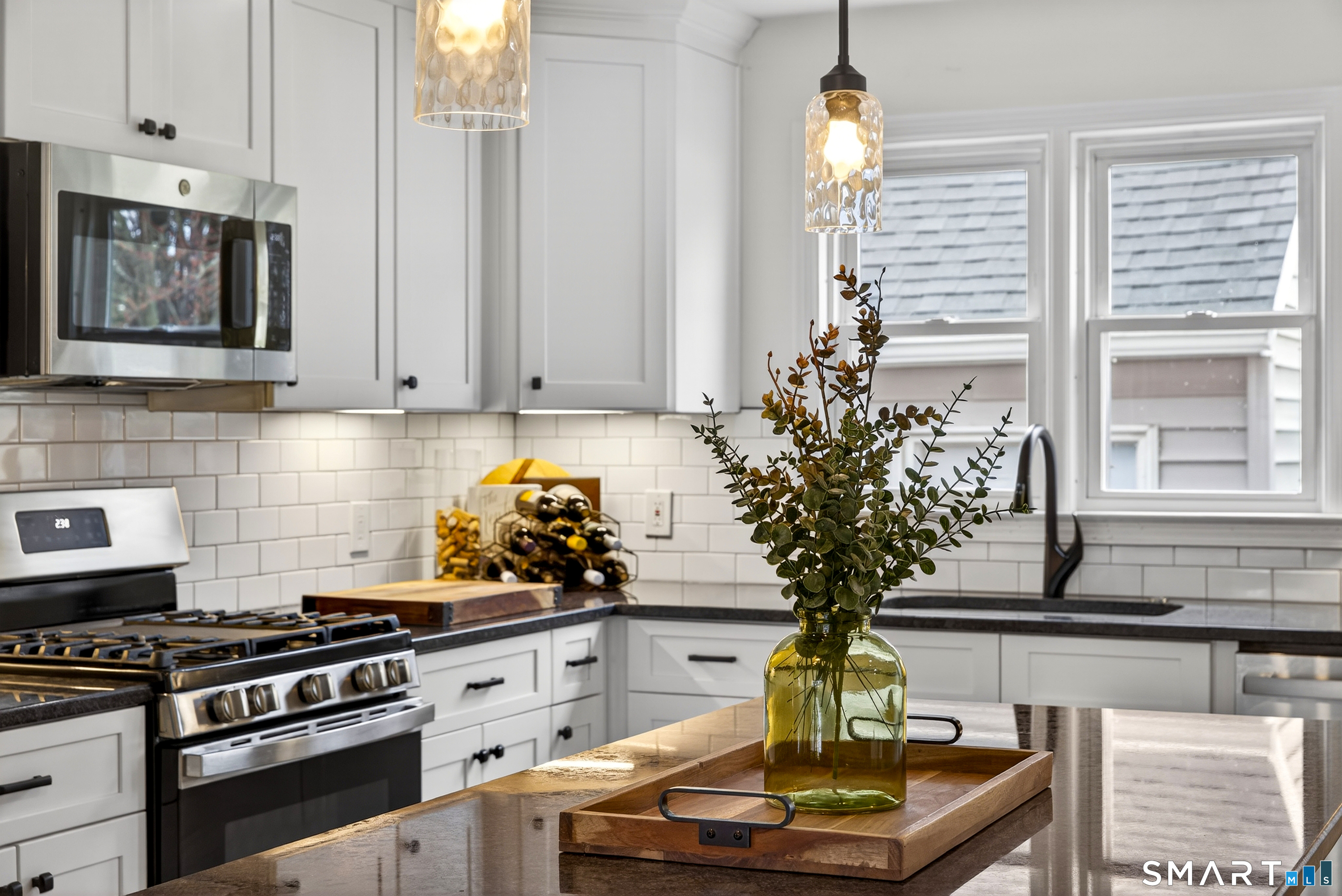 45 Walnut Street Milford, CT 06461 - Photo 17 of 39 a vase of flowers sitting on a table