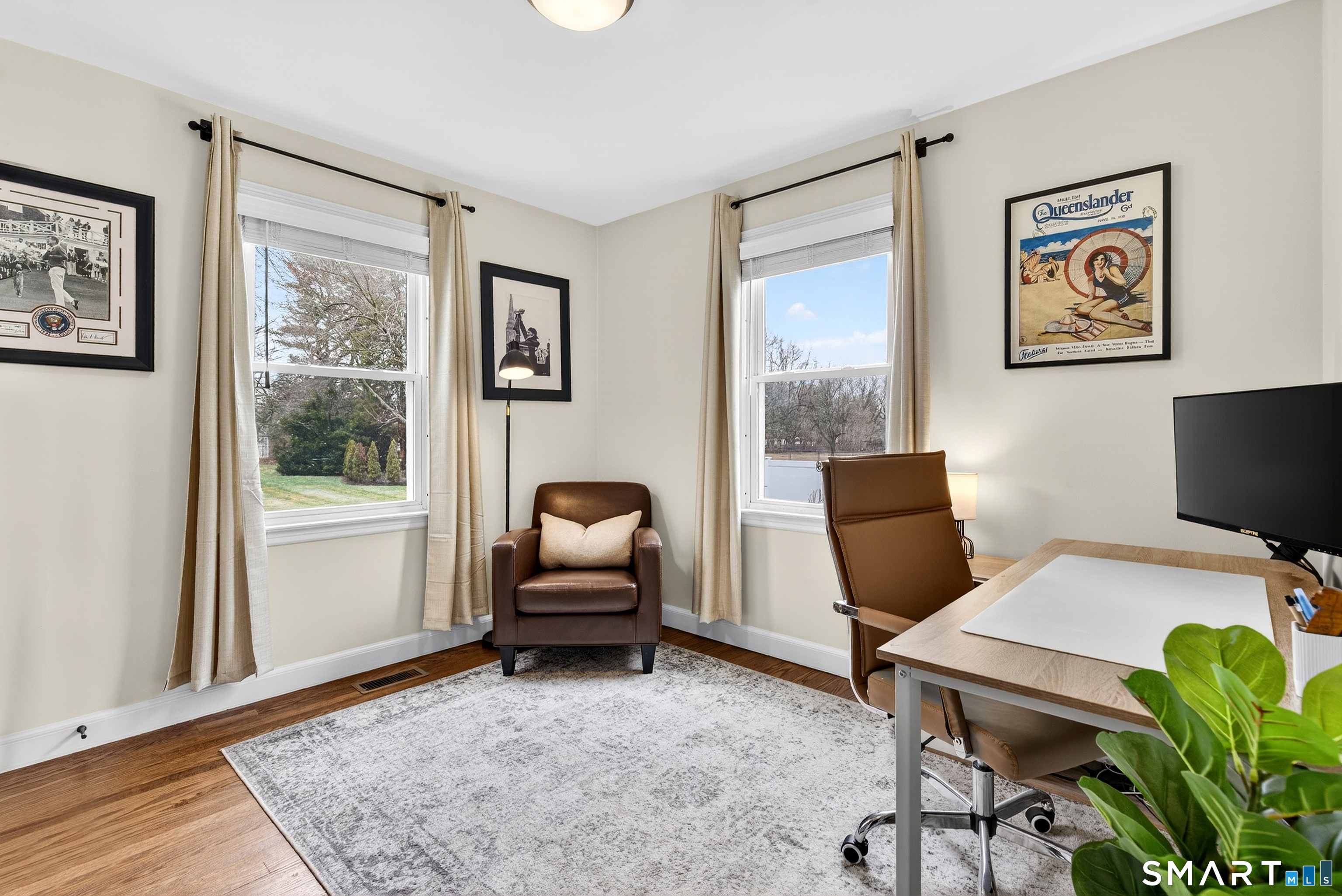 45 Walnut Street Milford, CT 06461 - Photo 19 of 39 a workspace with furniture and a window