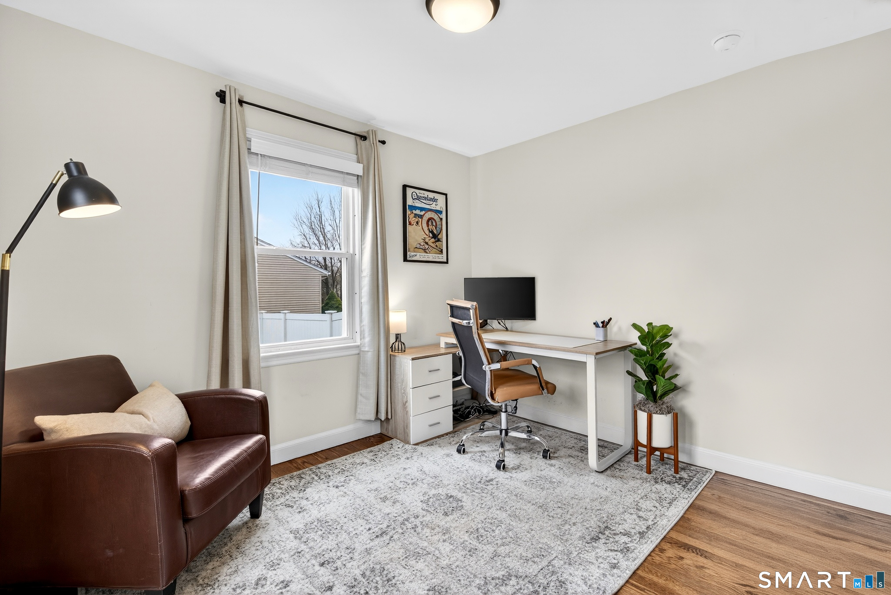 45 Walnut Street Milford, CT 06461 - Photo 20 of 39 a workspace with furniture and a window