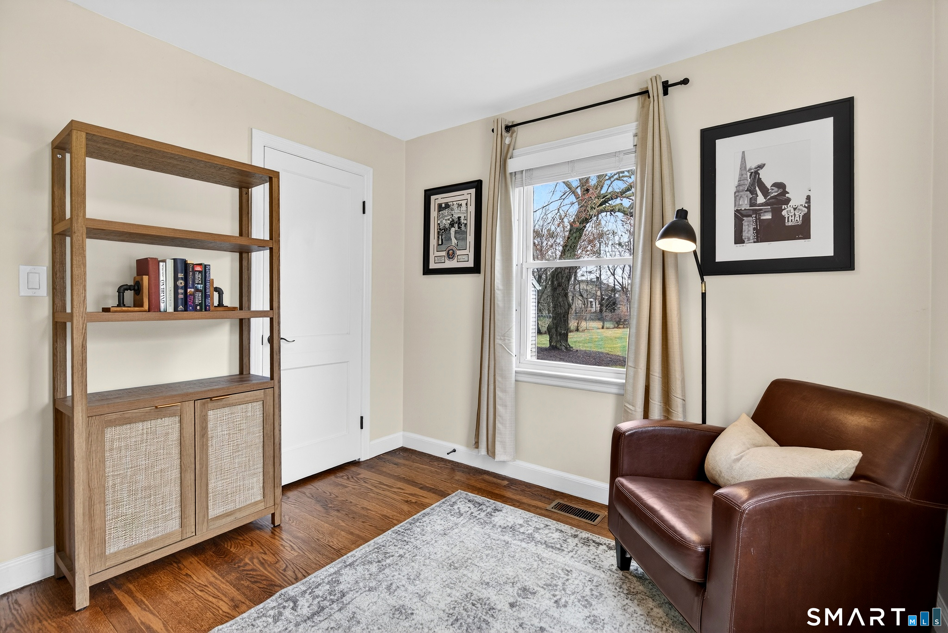 45 Walnut Street Milford, CT 06461 - Photo 21 of 39 a living room with furniture and wooden floor