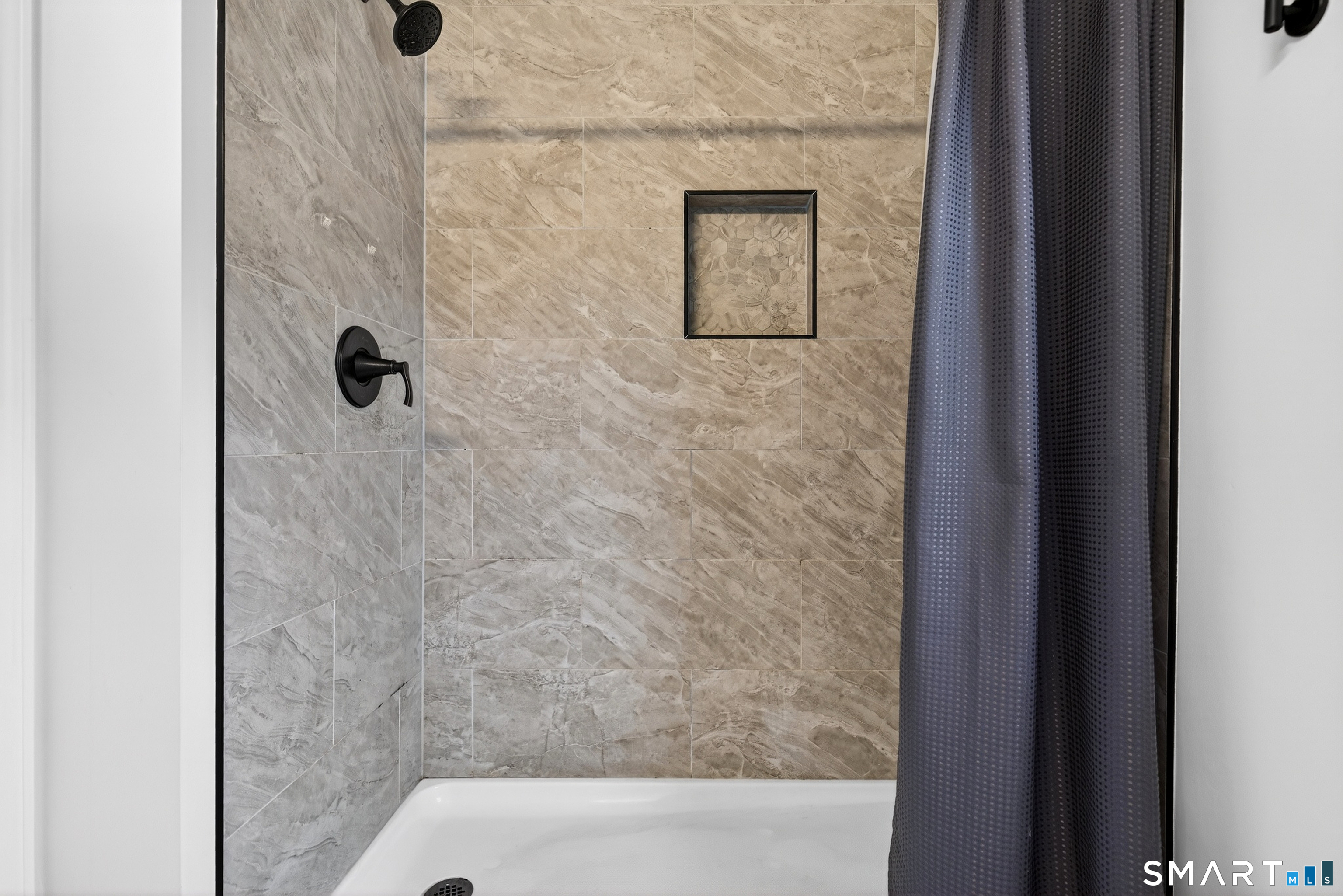 45 Walnut Street Milford, CT 06461 - Photo 25 of 39 a bathroom with a shower