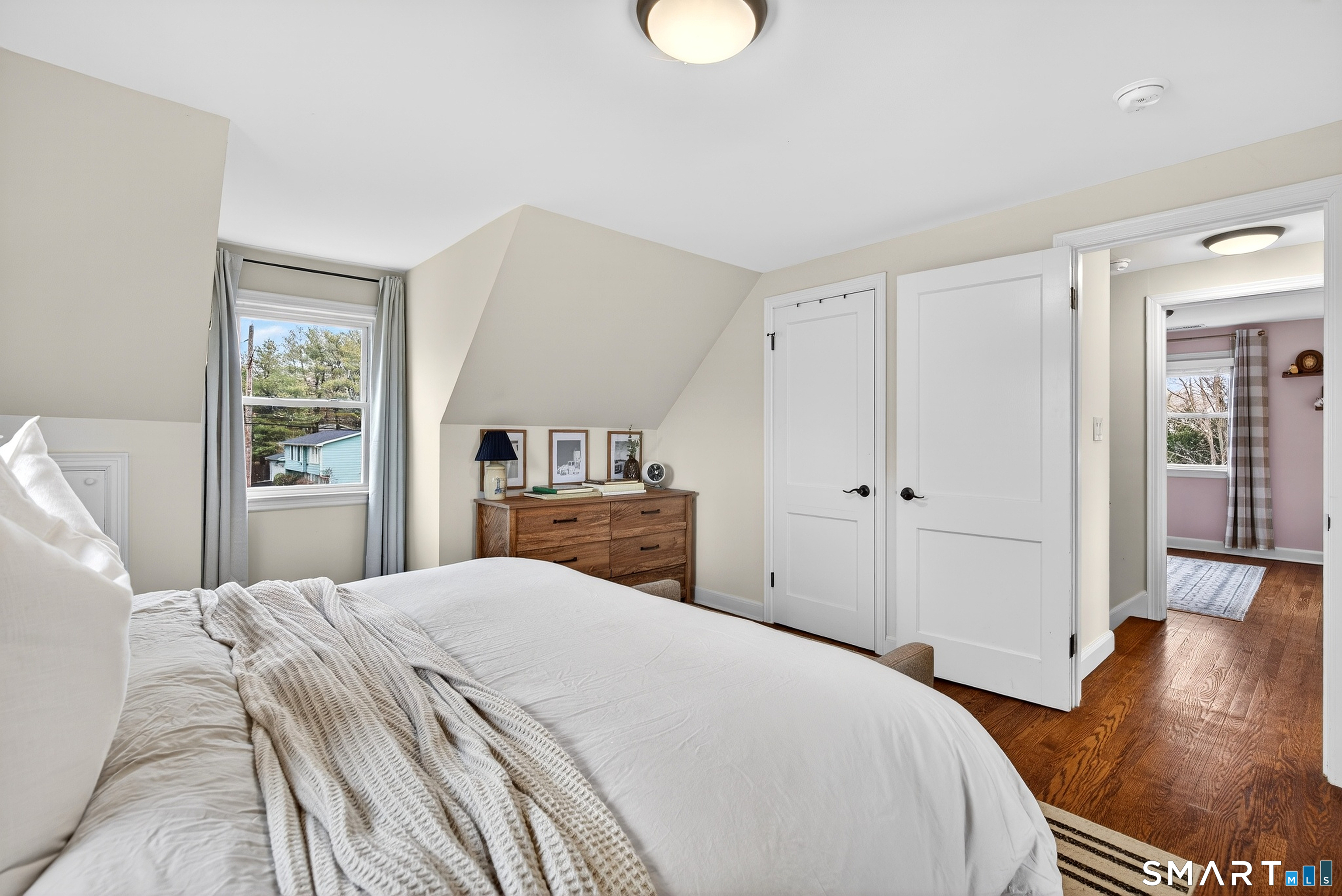 45 Walnut Street Milford, CT 06461 - Photo 26 of 39 a bedroom with a bed and a window