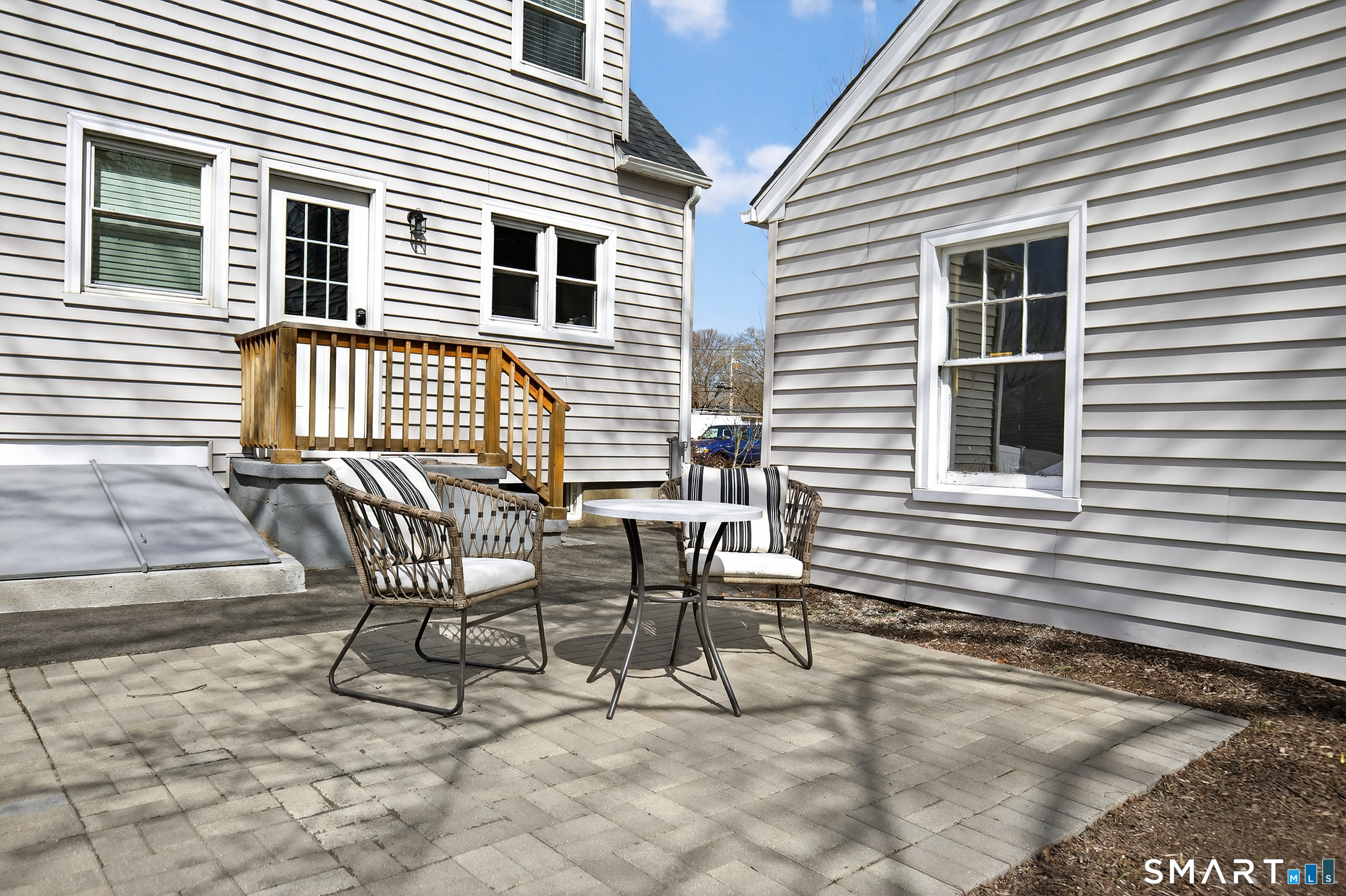 45 Walnut Street Milford, CT 06461 - Photo 32 of 39 a view of a house with backyard and sitting area