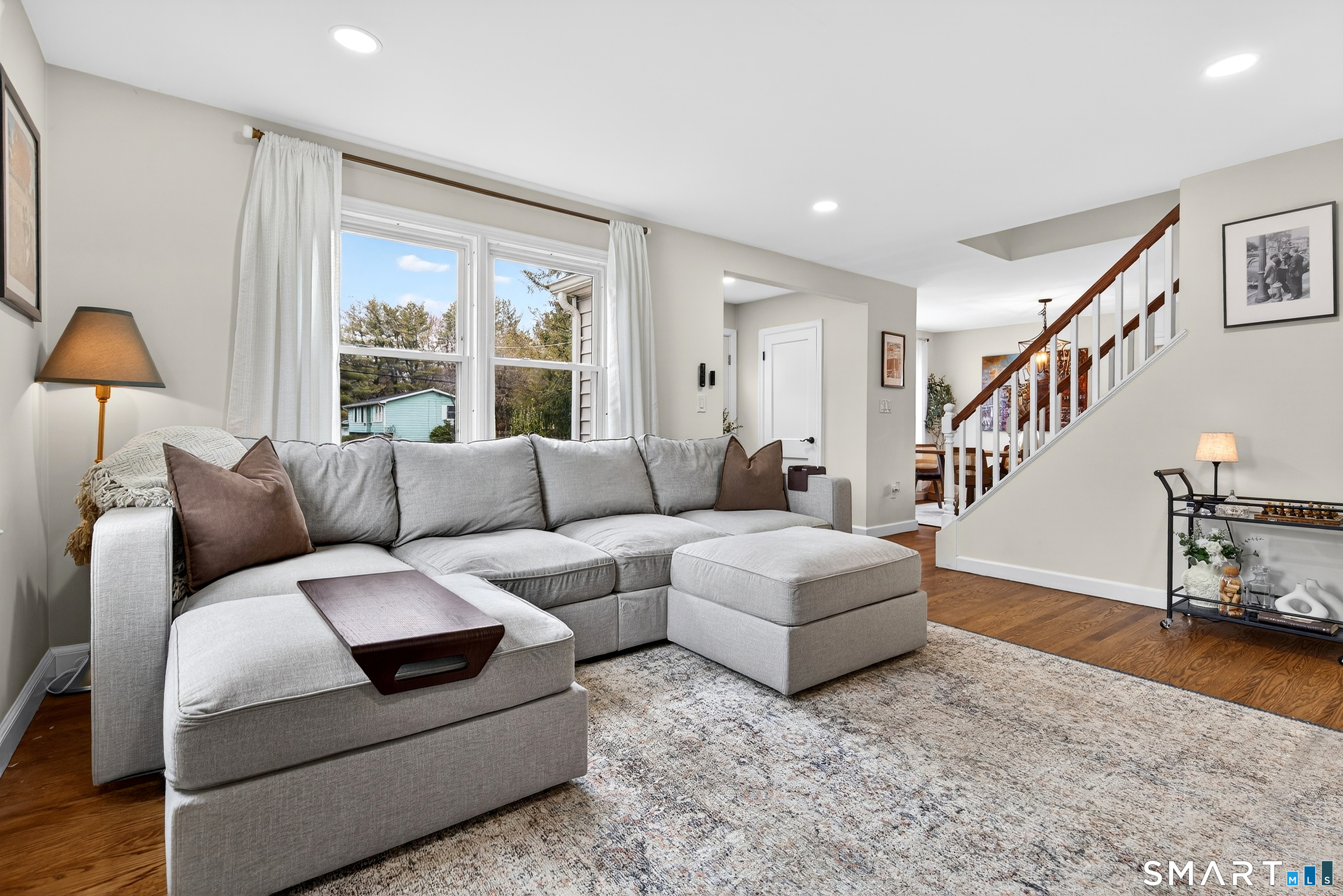 45 Walnut Street Milford, CT 06461 - Photo 6 of 39 a living room with furniture and a large window