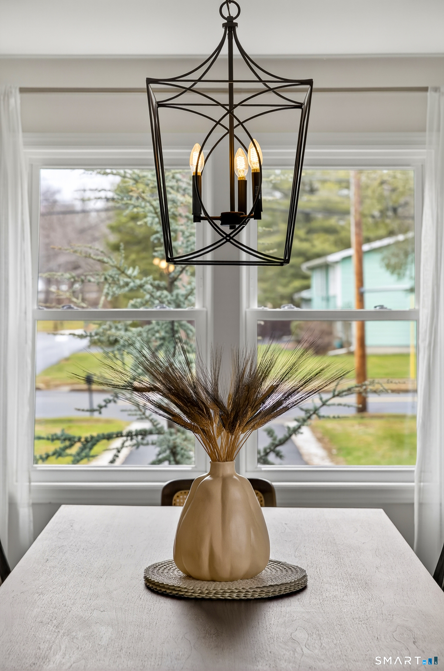 45 Walnut Street Milford, CT 06461 - Photo 10 of 39 a vase of flowers sitting on a table