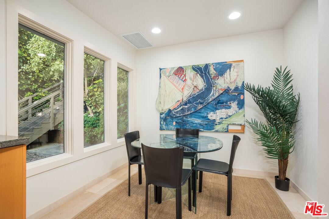 24456 Malibu Road Malibu, CA 90265 - Photo 12 of 33 a view of a livingroom with furniture and a potted plant