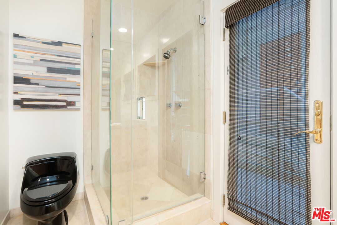 24456 Malibu Road Malibu, CA 90265 - Photo 23 of 33 a bathroom with a shower