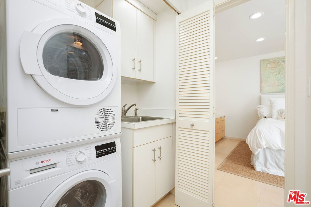 24456 Malibu Road Malibu, CA 90265 - Photo 25 of 33 a utility room with dryer and washer