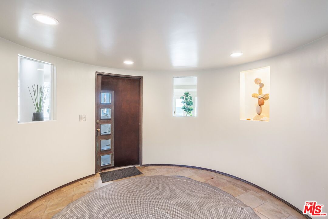 24456 Malibu Road Malibu, CA 90265 - Photo 26 of 33 an empty room with windows