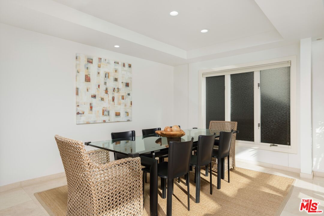24456 Malibu Road Malibu, CA 90265 - Photo 10 of 33 a dining room with furniture and wooden floor
