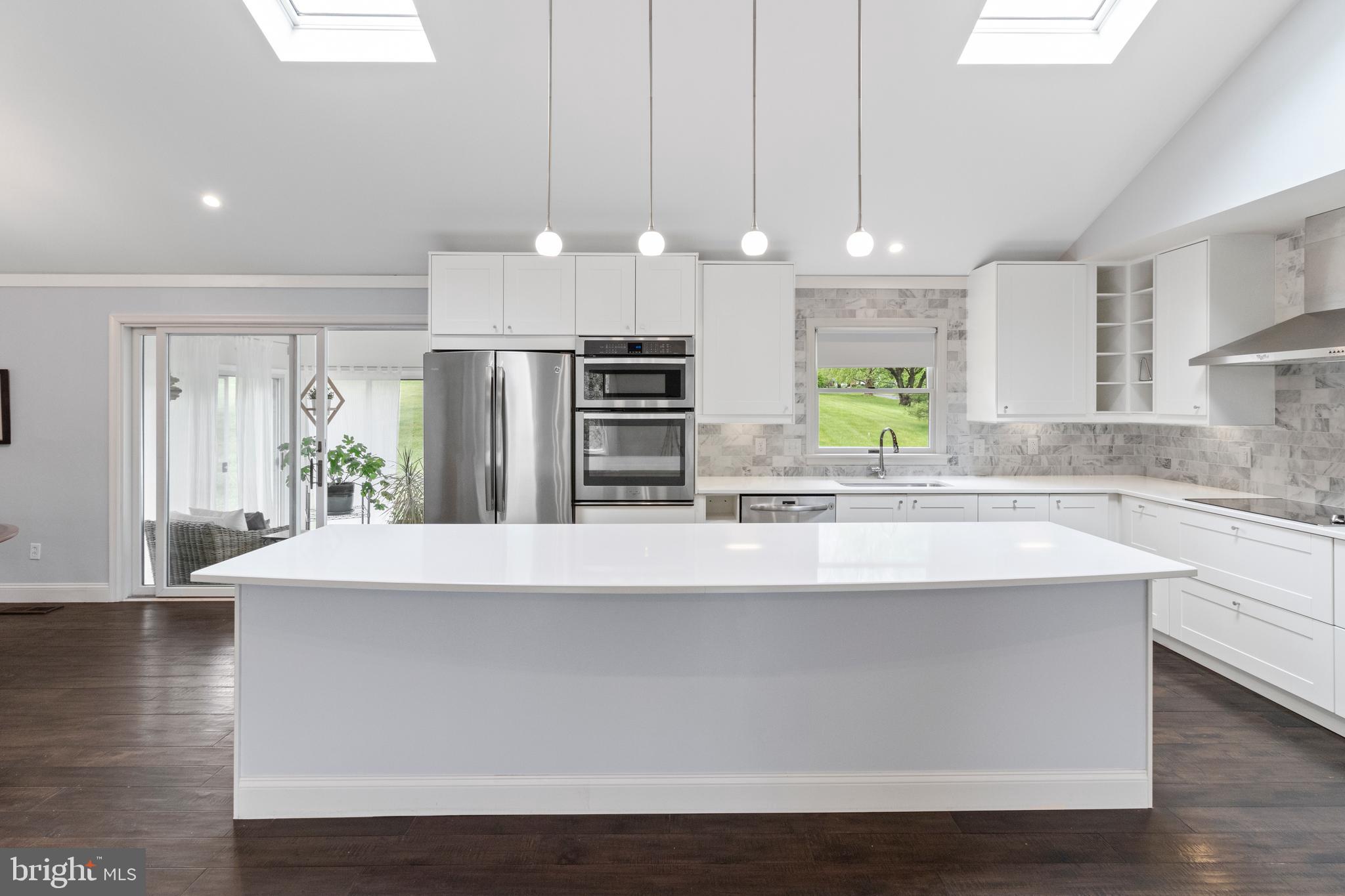 195 Firecreek Road Newtown, PA 18940 - Photo 9 of 23 Kitchen with large Breakfast Bar & Sky lights