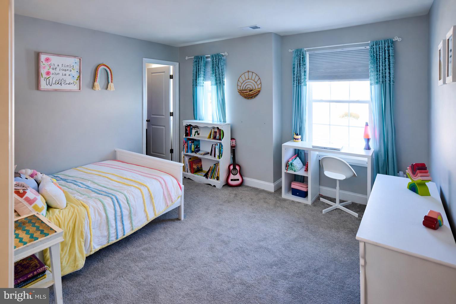 2015 Margrave Avenue Fallston, MD 21047 - Photo 11 of 20 a bedroom with a bed and a window