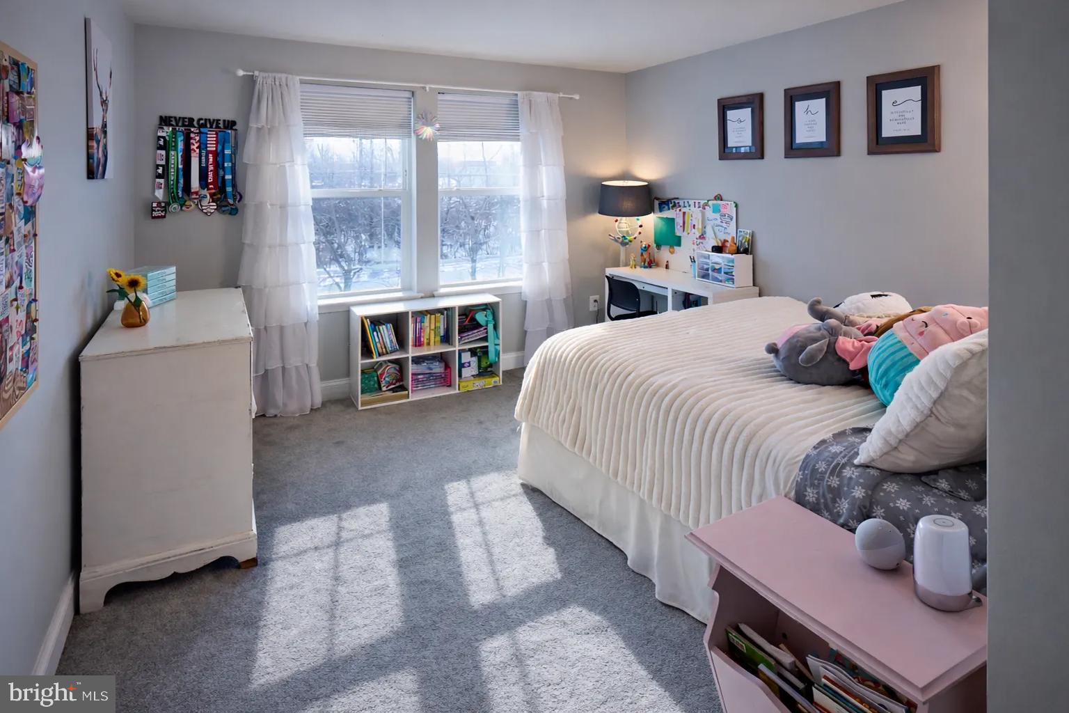 2015 Margrave Avenue Fallston, MD 21047 - Photo 8 of 20 a bedroom with a bed and a large window