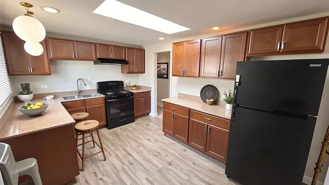 a bathroom with a bathtub sink and toilet