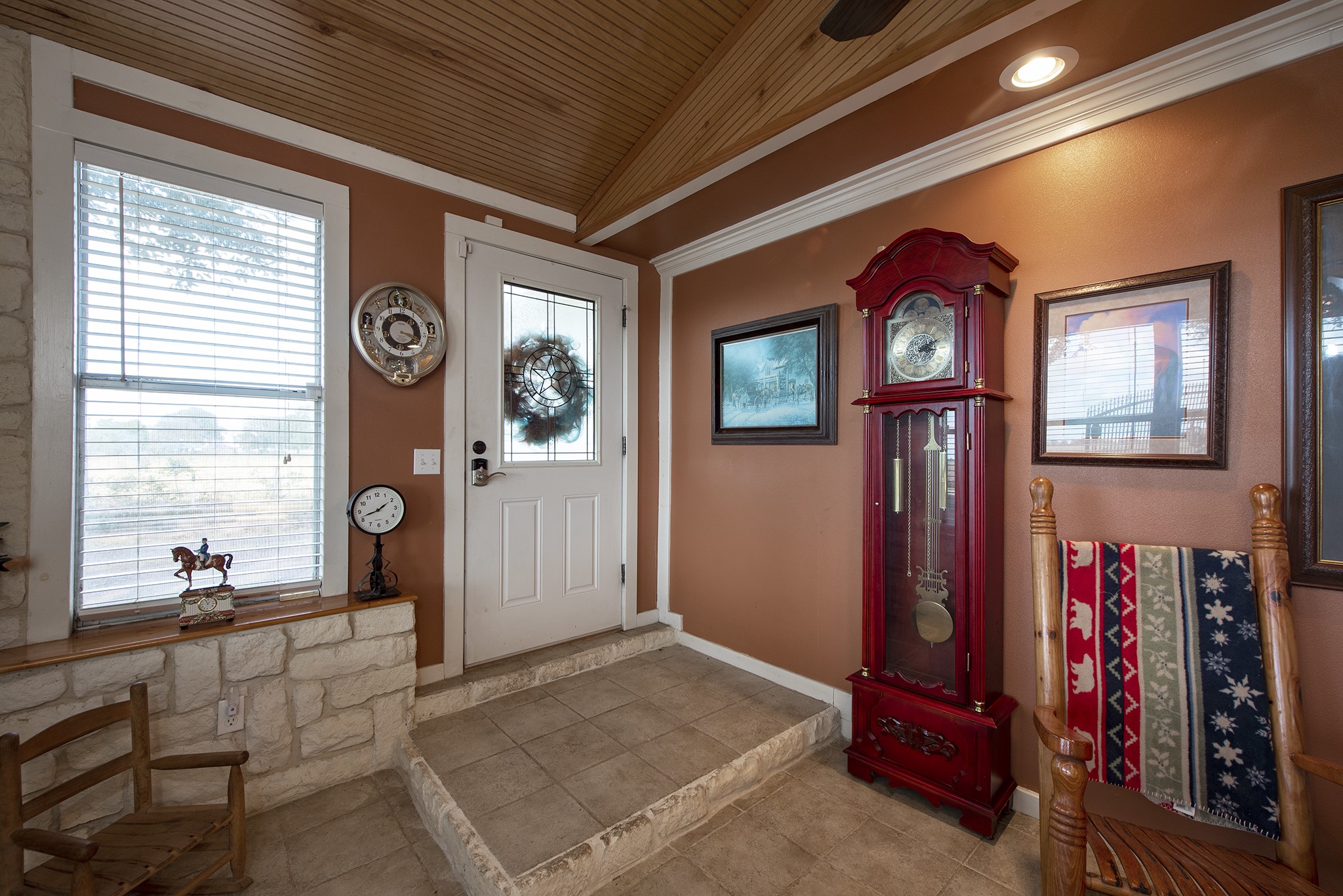 22234 Castle Road Waller, TX 77484 - Photo 14 of 50 a view of a hallway with wooden floor and windows