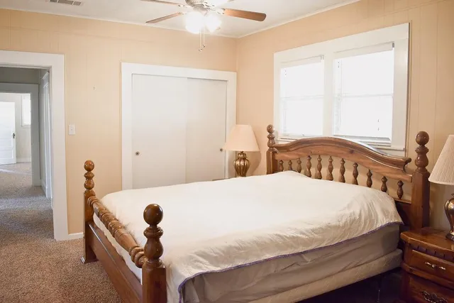 a view of a bathroom from a hallway