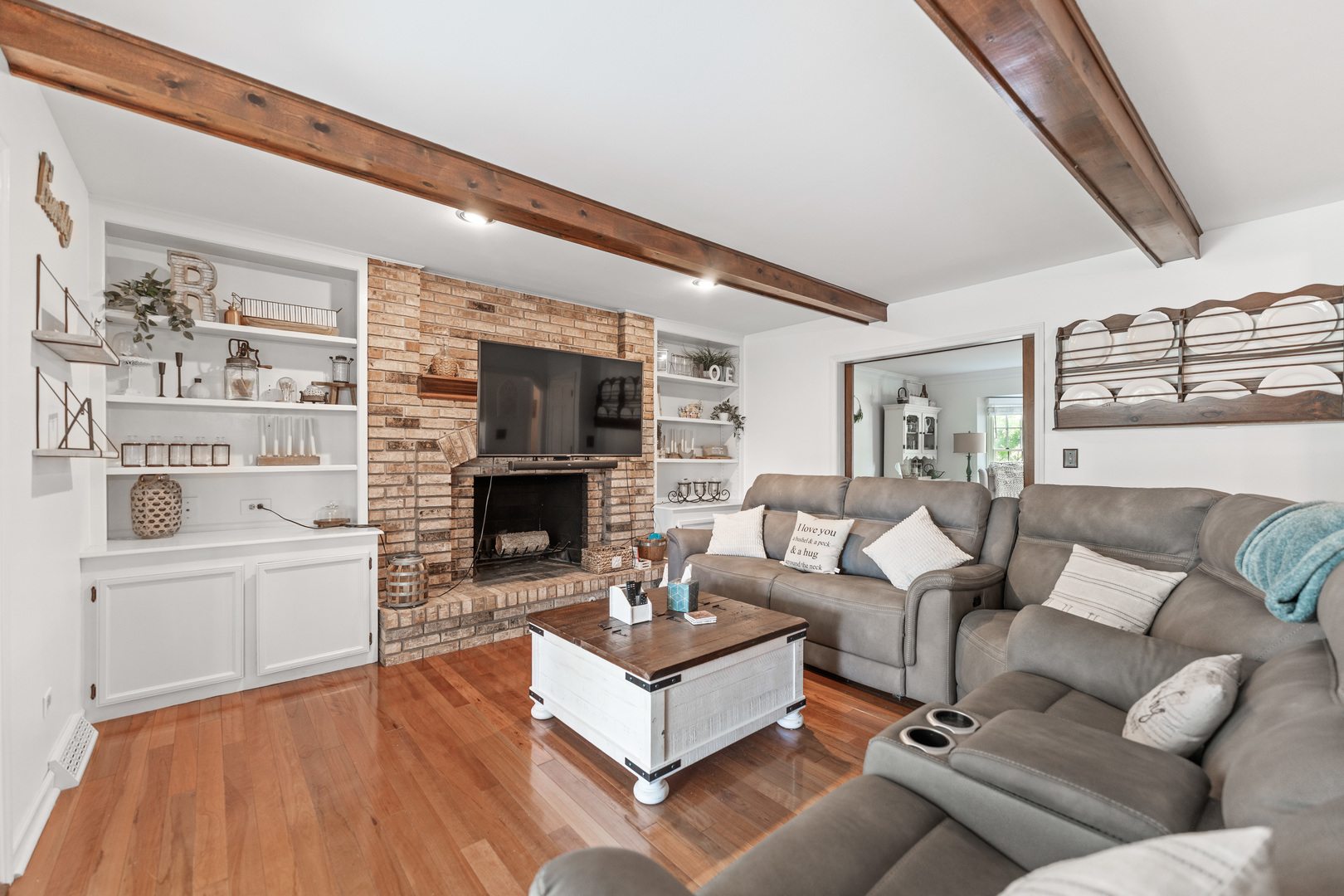 560 Renee Court Geneva, IL 60134 - Photo 11 of 50 a living room with furniture and a fireplace
