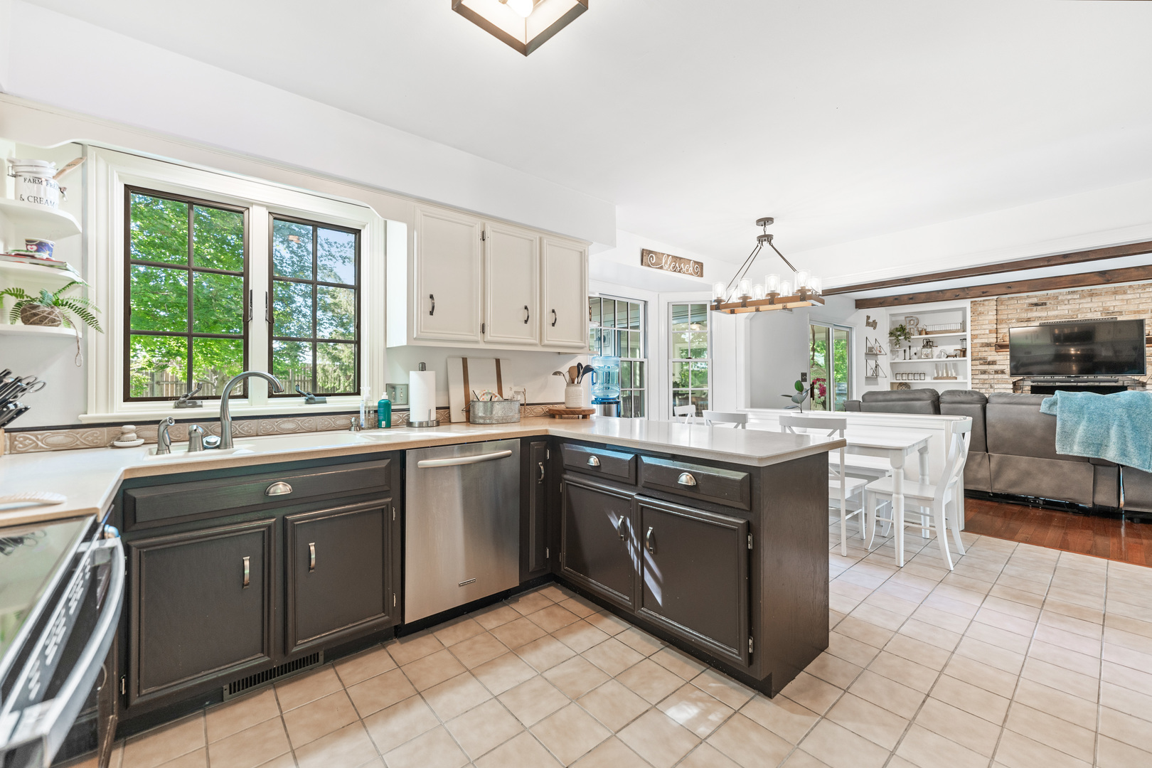 560 Renee Court Geneva, IL 60134 - Photo 18 of 50 a kitchen with a sink stove and cabinets