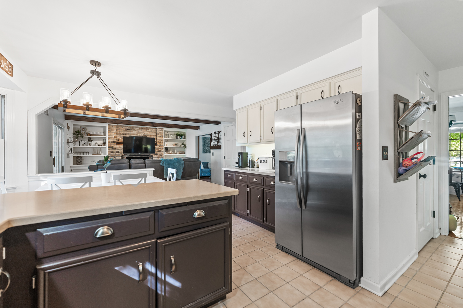 560 Renee Court Geneva, IL 60134 - Photo 19 of 50 a kitchen with a refrigerator and a sink