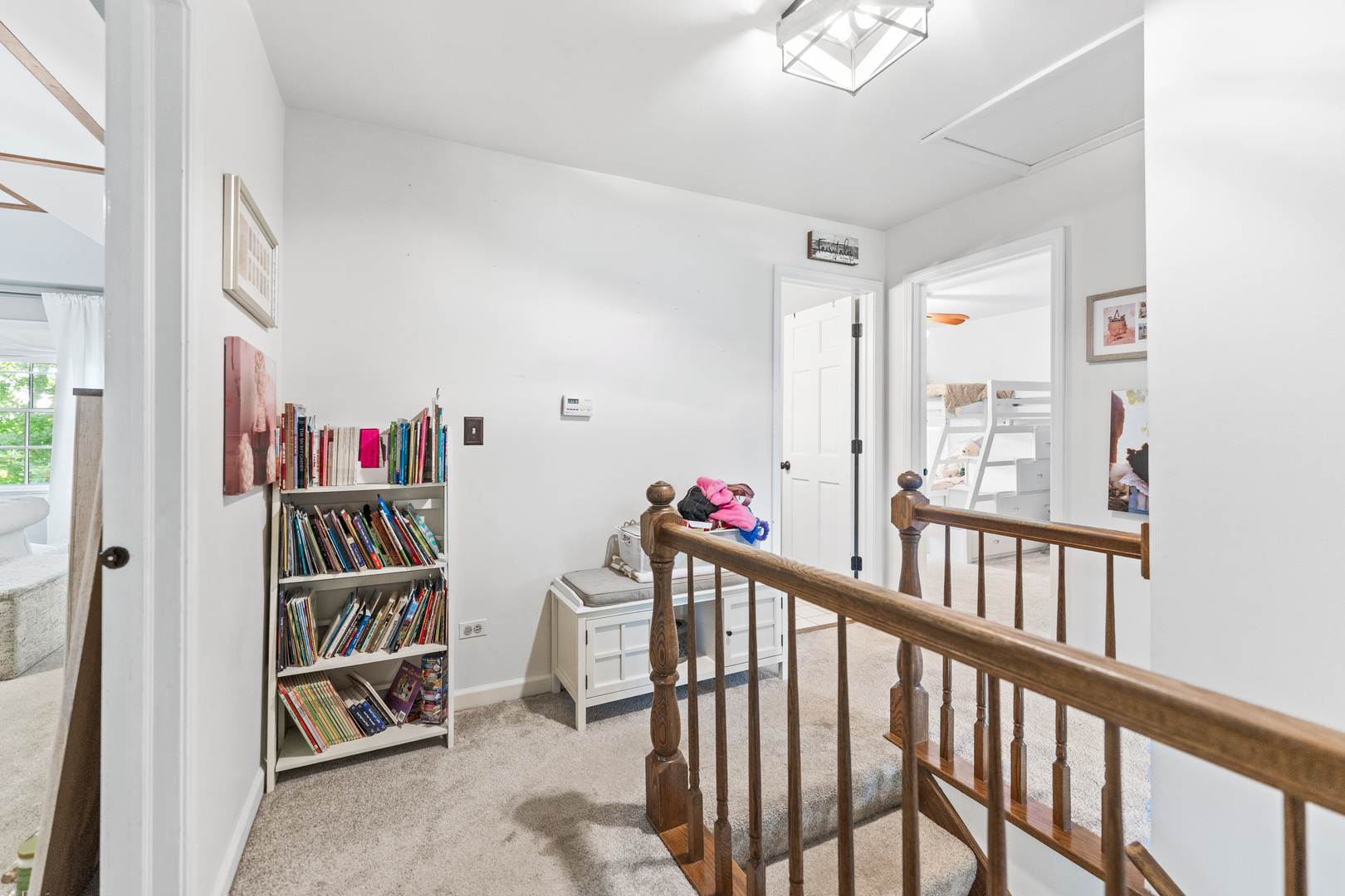 560 Renee Court Geneva, IL 60134 - Photo 25 of 50 a view of a hallway with shelves