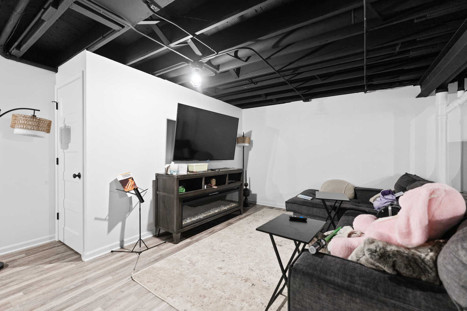 560 Renee Court Geneva, IL 60134 - Photo 38 of 50 a living room with furniture and a flat screen tv