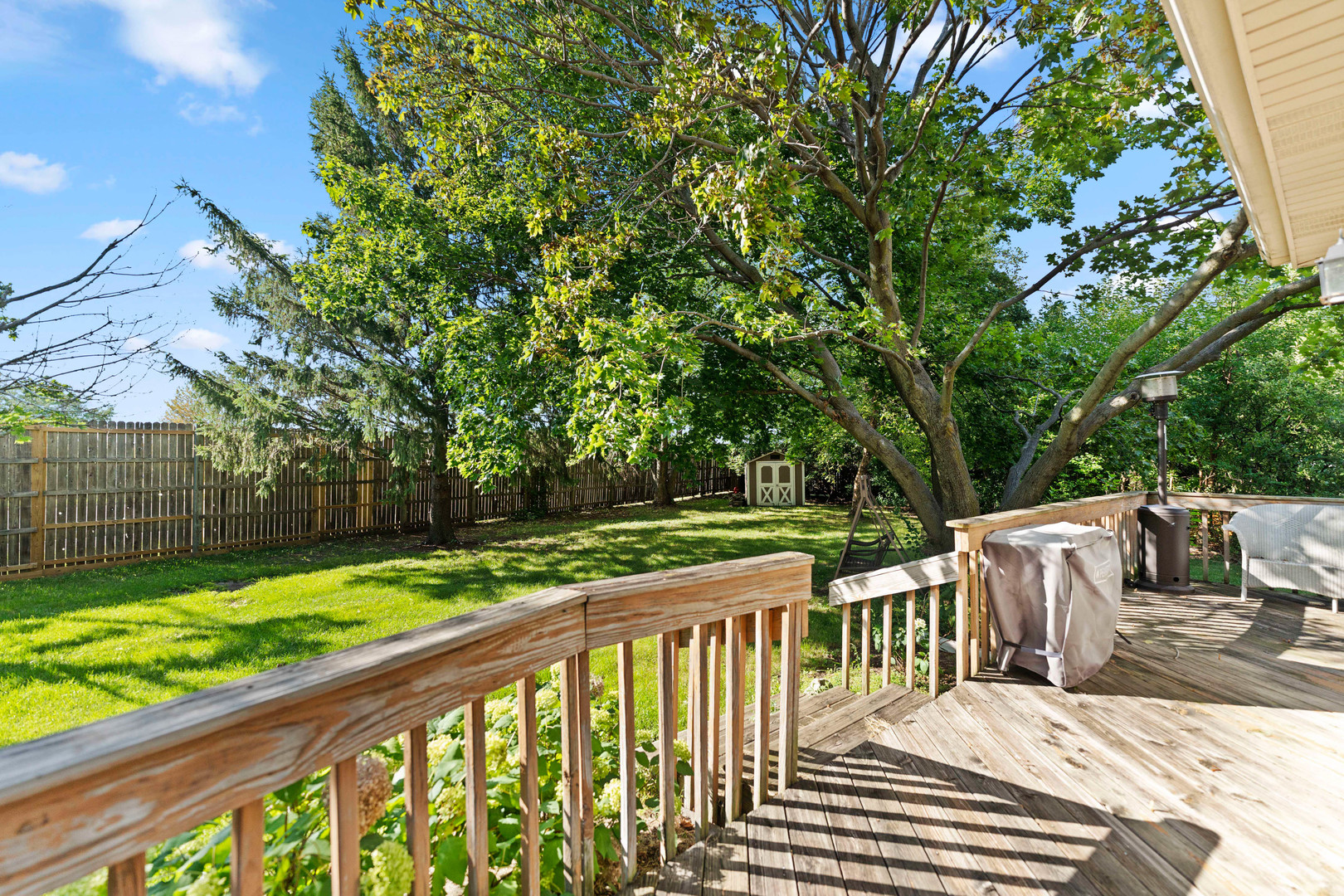560 Renee Court Geneva, IL 60134 - Photo 43 of 50 a view of outdoor space with deck and yard