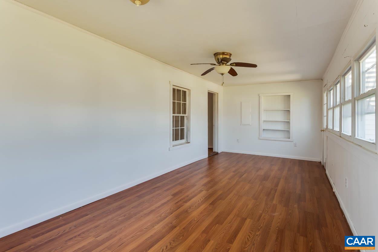 3810 South Constitution Route Dillwyn, VA 23936 - Photo 28 of 45 wooden floor in an empty room with a window