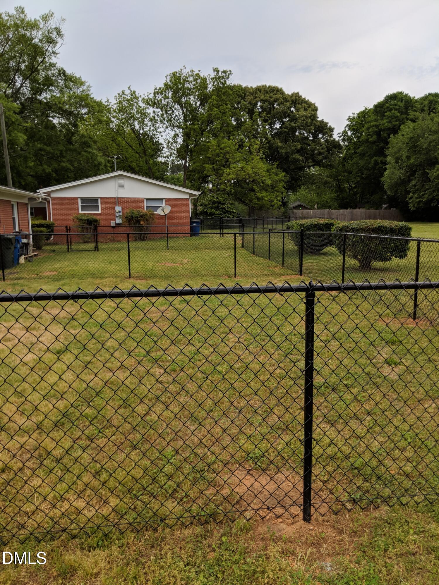 411 Rose Lane Raleigh, NC 27610 - Photo 2 of 12 a view of a tennis court