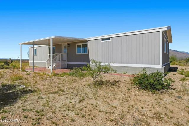 a backyard of a house with garden