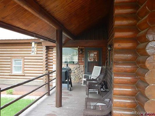 181 Doe Circle South Fork, CO 81154 - Photo 13 of 35 a view of living room with balcony and furniture