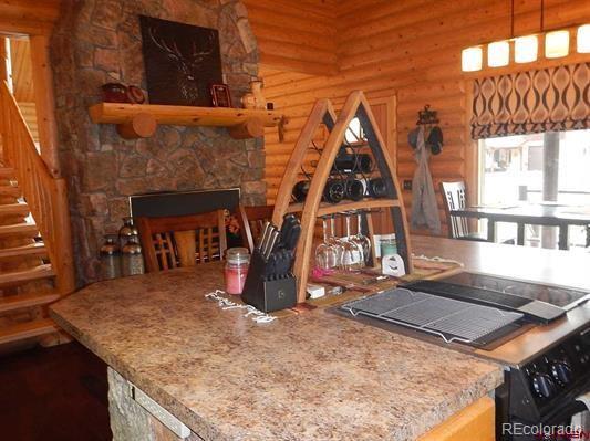 181 Doe Circle South Fork, CO 81154 - Photo 15 of 35 a view of a house with roof deck