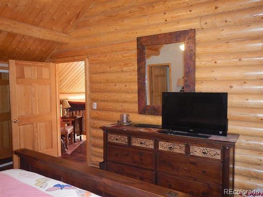 181 Doe Circle South Fork, CO 81154 - Photo 26 of 35 a living room with furniture and a flat screen tv