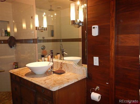 181 Doe Circle South Fork, CO 81154 - Photo 28 of 35 a bathroom with a sink and a mirror