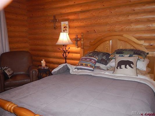 181 Doe Circle South Fork, CO 81154 - Photo 29 of 35 a room with a car parked