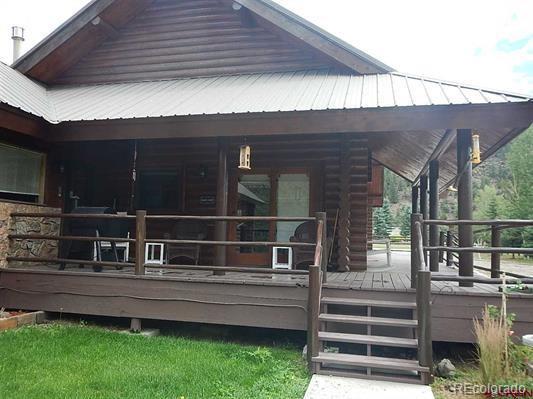 181 Doe Circle South Fork, CO 81154 - Photo 9 of 35 a view of backyard with deck