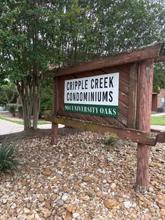 a sign on the side of the road