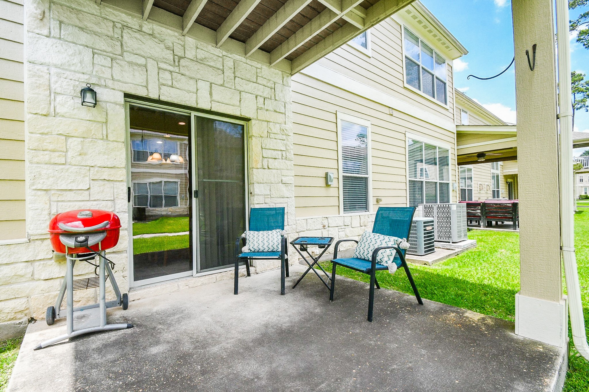 13600 Breton Ridge Street, Unit 36F Houston, TX 77070 - Photo 31 of 38 Private covered patio ideal for relaxing outdoors.