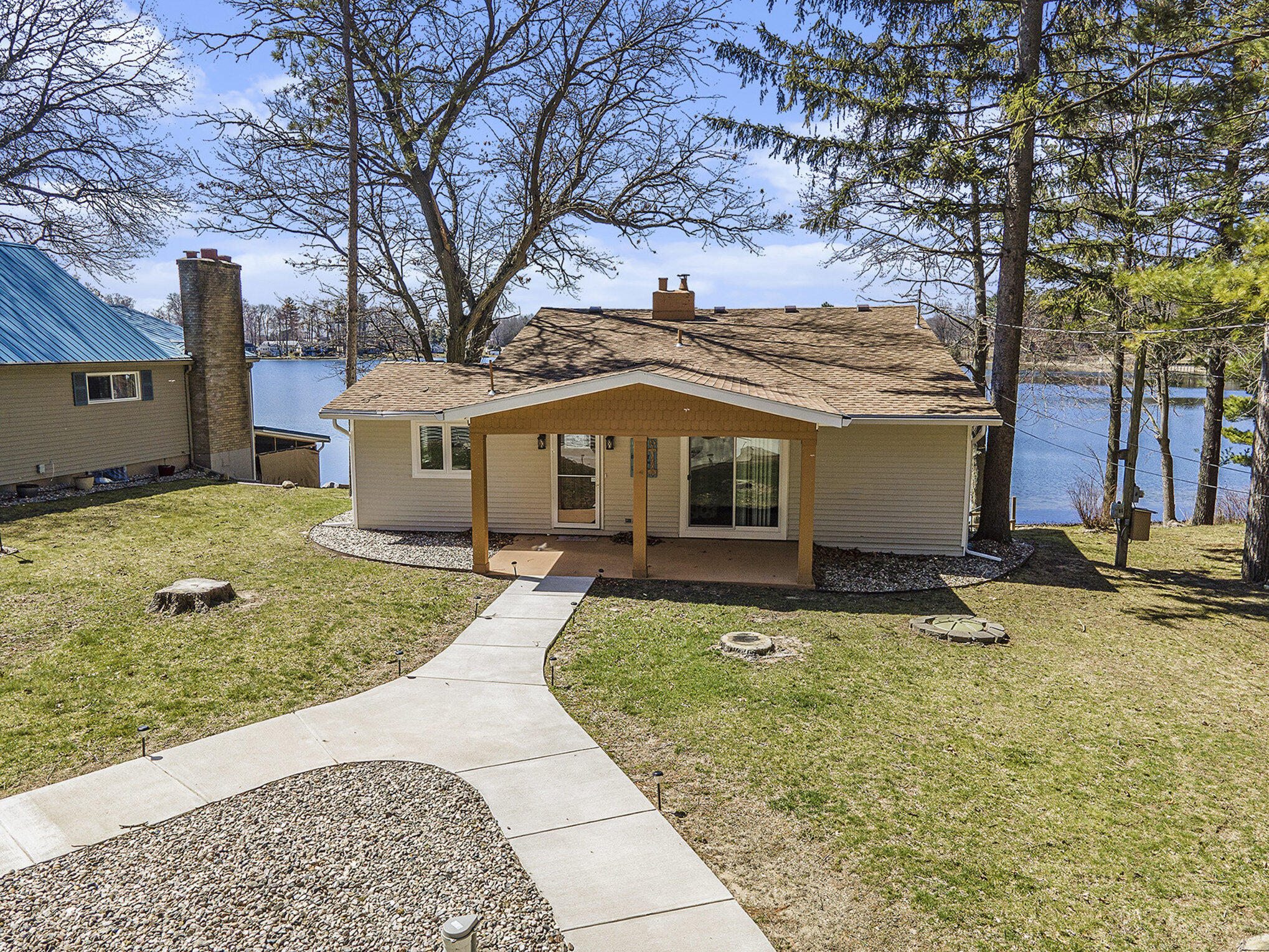 671 Rojean Southwest Stanton, MI 48888 - Photo 1 of 35 029_671_rojean_drone-02_702