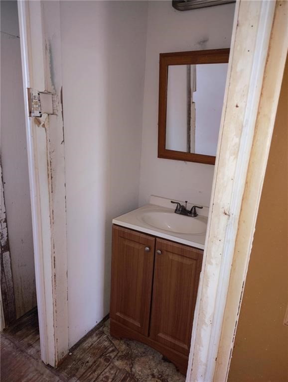 5469 War Bonnet Drive Robstown, TX 78380 - Photo 7 of 12 a bathroom with a sink a mirror and shower
