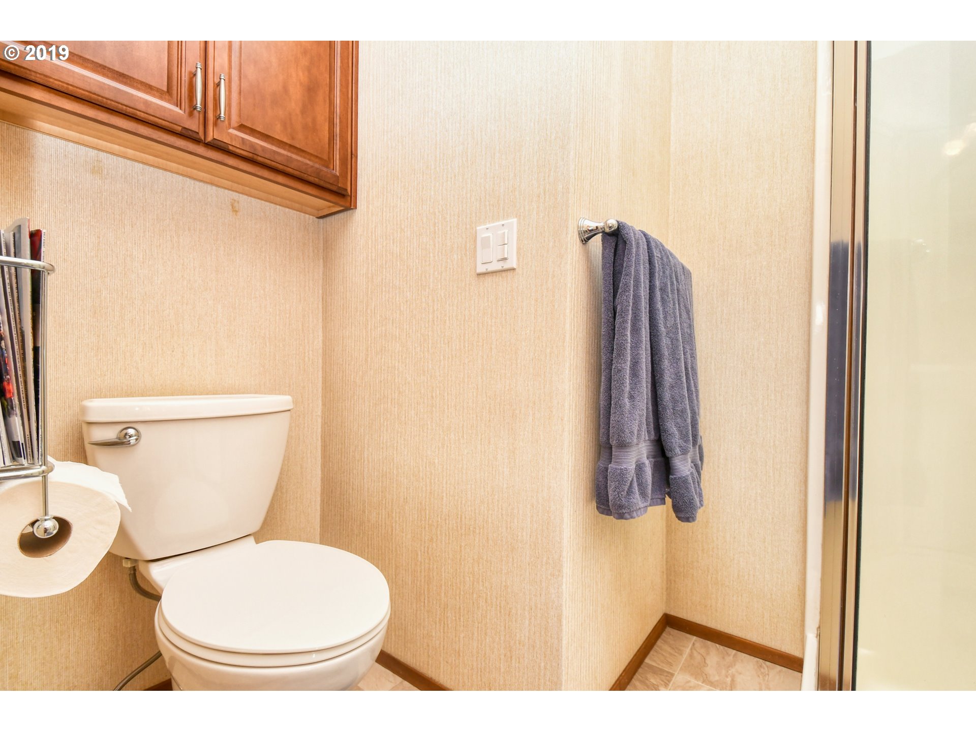 1610 Southwest 18th Street Pendleton, OR 97801 - Photo 14 of 32 a bathroom with a toilet and a shower