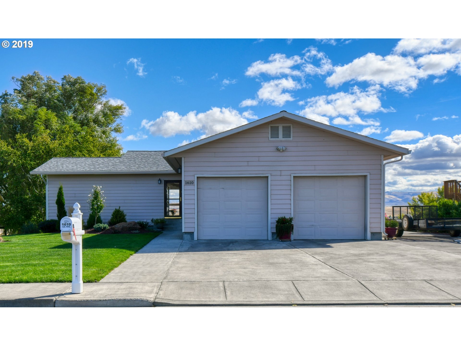 1610 Southwest 18th Street Pendleton, OR 97801 - Photo 2 of 32 a view of a house with a yard