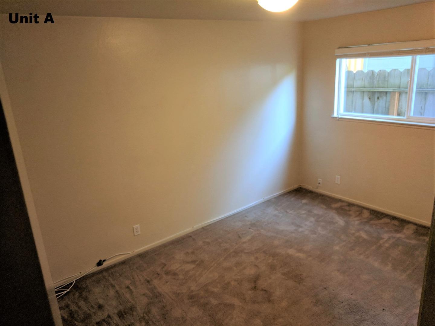 1830 48th Avenue Capitola, CA 95010 - Photo 22 of 32 an empty room with a window