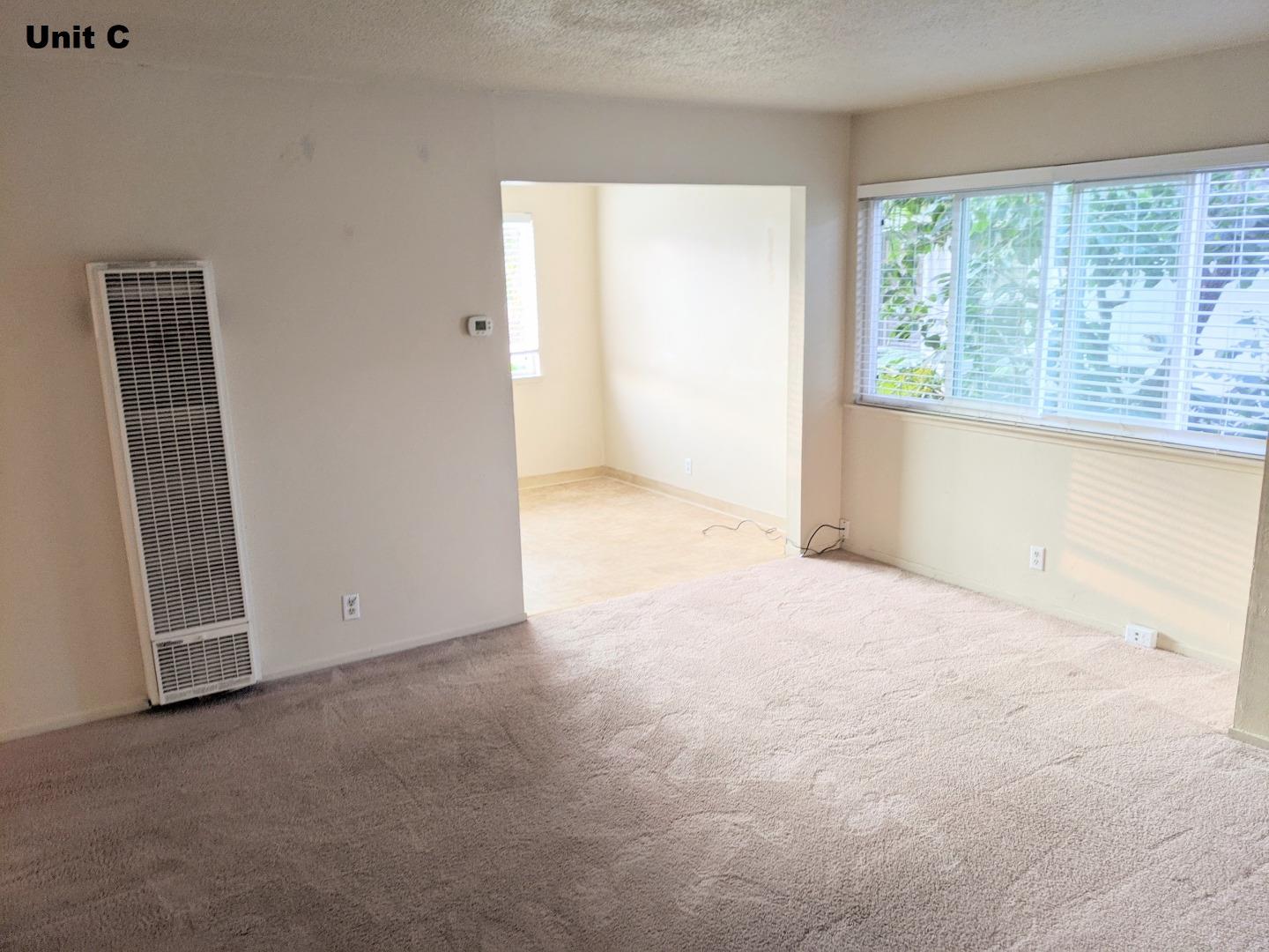 1830 48th Avenue Capitola, CA 95010 - Photo 25 of 32 an empty room with windows