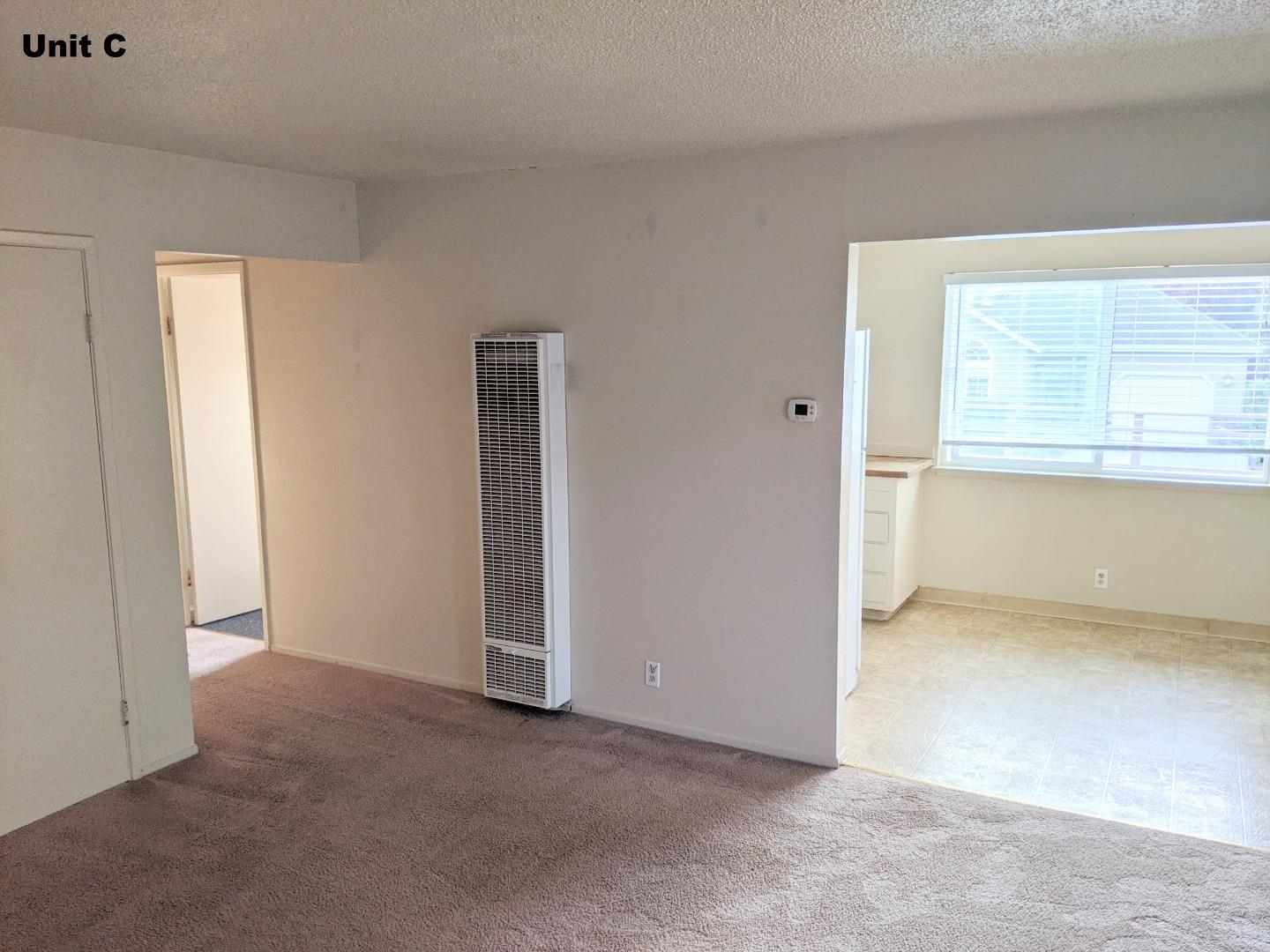 1830 48th Avenue Capitola, CA 95010 - Photo 26 of 32 an empty room with windows