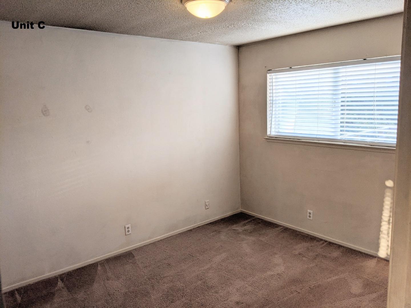 1830 48th Avenue Capitola, CA 95010 - Photo 29 of 32 an empty room with a window