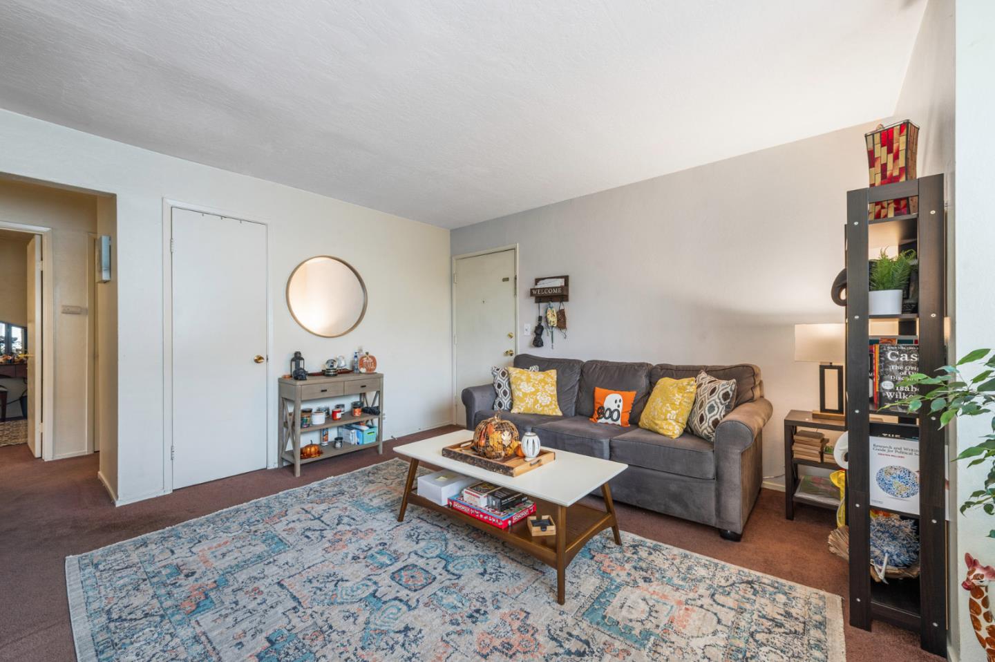 1830 48th Avenue Capitola, CA 95010 - Photo 4 of 32 a living room with furniture and wooden floor